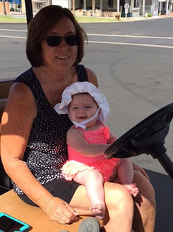 Rhonda Ciacco, teaching her granddaughter about life at the park