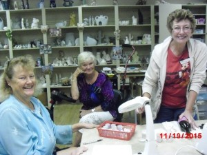 These classmates are working on a ceramic project in Room 9 Pictured are Kathleen McDowell, Teresa Carrier and Instructor Nancy Lambertson.